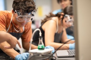 high school student in science class