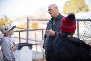 Teacher and students outdoors
