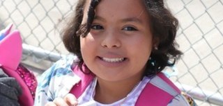 elementary student smiling