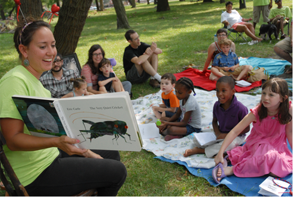 Story Time in the Park (870x588) (PNG) Reading to families during Story Time at the Park