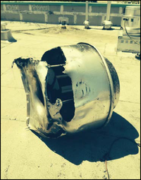 Vandalized mechanical equipment on a rooftop