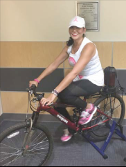 Vanessa Olguin on stationary bike