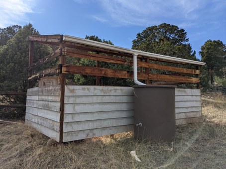SMNHC bird blind, outdoor classroom, and wildlife drinker with trail camera.