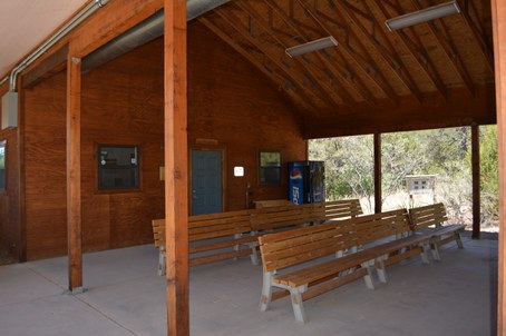 Nice wood benches under peak-roofed breezeway