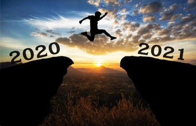 picture of a guy leaping over crevice from 2020 to 2021
