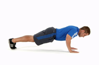 picture of the video of a man in a plank to push up position.