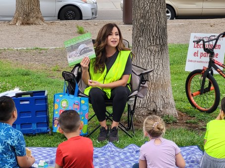 Jessica reading at Grisham Park